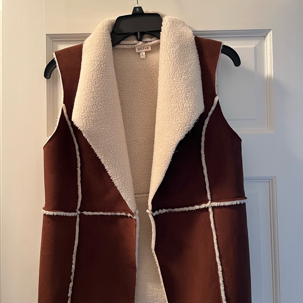 Women’s vest, size small , brown with cream shearling . Size small . Worn once